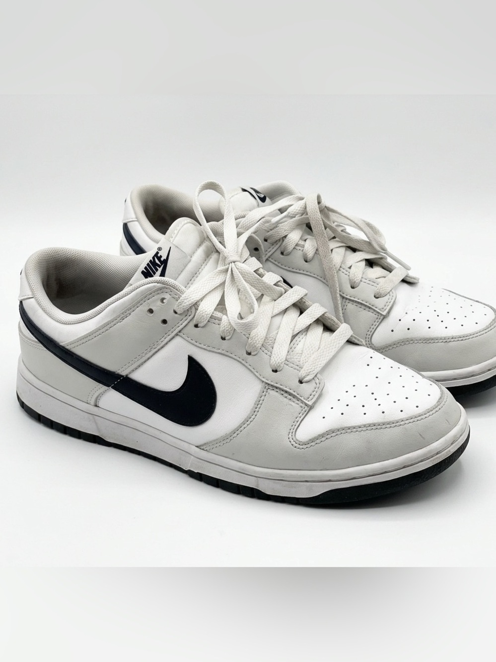 Nike Men’s Low-Top Sneakers in White and Black Swoosh